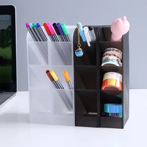 Detailed macro view of black and white slanted desktop organizers with pens and tapes