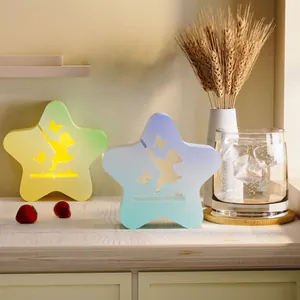 Vista detallada de candelabros en forma de estrella con diseño de hadas para bricolaje