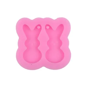 Overhead view of a pink double-cavity rabbit silicone mold for DIY crafts and resin art