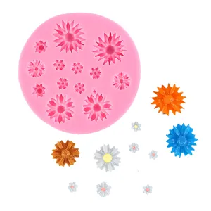 Pink daisy flower silicone mold for DIY fondant cake decorating and resin casting.