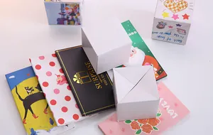 Detailed view of DIY surprise explosion bounce gift boxes with various colorful patterns.