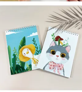 Detail of cartoon A4 sketchbooks featuring cute cat and duck illustrations