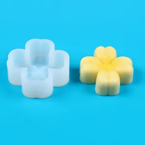 Detailed view of DIY flower and four-leaf clover silicone mold for candle making