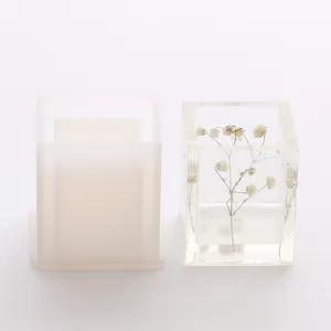 Square silicone mold for DIY crafts with a clear resin pen holder finished detail