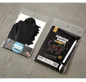 Close-up of Yuelu animal and ocean scratch art kits for children's DIY crafts.
