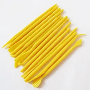 Detail view of 14-piece yellow plastic clay sculpting and fondant modeling tool set