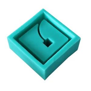 Detailed top view of a teal square silicone mold for succulent pots or candle holders