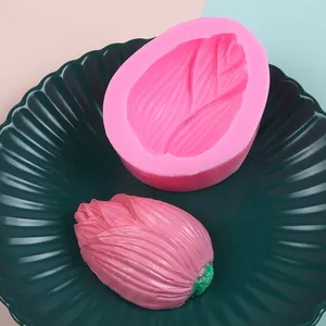 Detail view of pink flower bud silicone mold with matching textured floral resin bud
