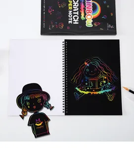 Open rainbow scratch paper notebook with colorful hand-drawn girl illustration