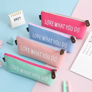 Set of four colorful large capacity PU leather pencil cases with inspirational print