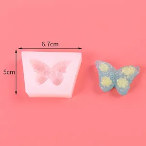 Detailed view of butterfly silicone mold with specific dimensions 6.7cm by 5cm for DIY cake decor
