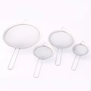 Detailed view of four different sizes of stainless steel fine mesh flour sifters