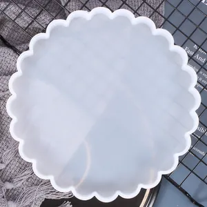 Detailed macro view of a translucent scalloped round silicone mold for DIY crafts