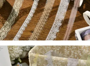 Detailed view of vintage white lace PET decorative tapes displayed on wooden surface