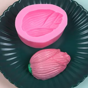 Detailed macro view of a 3D pink silicone flower bud mold and its textured finished product
