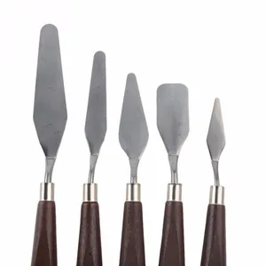 Detailed view of 5-piece stainless steel palette knife set with ergonomic wooden handles.
