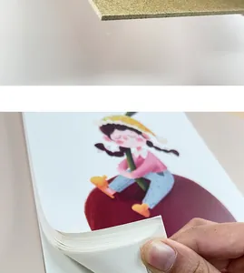 Close-up view of thick paper pages in an A4 cartoon sketchbook for kids drawing