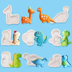 Collezione di vari stampi in silicone di dinosauri cartoni animati per decorazione torte in pasta