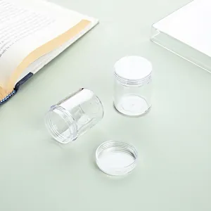 Détail de bocaux de rangement ronds en acrylique transparent pour perles et accessoires