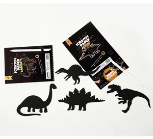 Creative DIY dinosaur scratch paper art kit featuring 8 shaped cards and tools for kids.