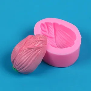 Detail view of pink flower bud silicone mold and finished decorative craft