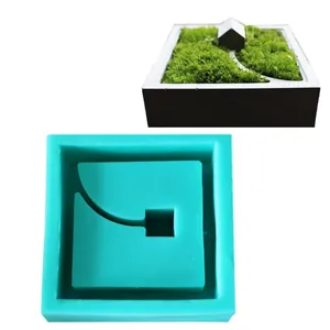 Teal silicone mold for DIY concrete succulent planter and gypsum candle holder