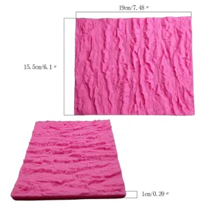 Detalle del molde de silicona grande con textura de corteza para tartas