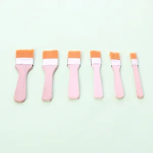 Detailed view of six professional nylon basting brushes with wooden handles for BBQ