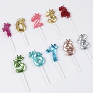 Colorful crown number candles for birthday party cake decoration set.