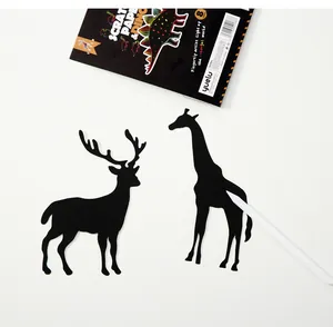 Detail of animal-shaped scratch art cards with stylus tool from DIY craft set