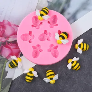 Detalle del molde de silicona de abeja rosa con abejas decorativas para pasteles DIY