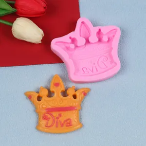 Detailed macro view of a pink crown silicone mold and Diva engraved fondant piece