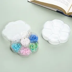 Boîte de rangement en acrylique transparent en forme de fleur avec des perles