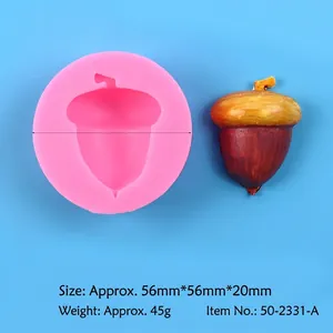 Detailed view of hazelnut silicone mold with dimensions and finished resin acorn