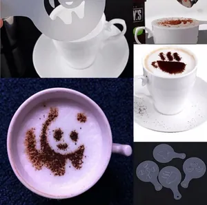 Close-up detail of plastic coffee art stencils with panda and heart latte art patterns