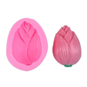 Detail view of a 3D pink flower bud silicone mold with a finished pink craft sample.