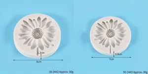 Detailed view of two sizes of daisy sunflower silicone molds for DIY chocolate cake decoration