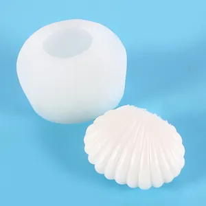 Shell shaped silicone mold for DIY aromatherapy candles and resin crafts shown with finished product