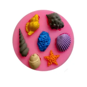 Detail of ocean-themed silicone mold with colorful shell and starfish shapes