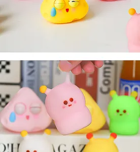 Close-up of a pink cartoon slow rebound squeeze toy showing its cute face and soft texture.