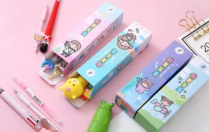 Close-up of colorful cute cartoon stationery blind boxes with pens and accessories