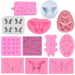 Vue détaillée de divers moules en silicone papillon pour la décoration de fondant et chocolat