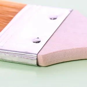 Close-up detail of a professional nylon basting brush with premium stainless steel ferrule