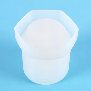 Detailed view of a threaded cylindrical silicone resin mold for DIY pen holders.