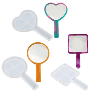 Vue détaillée de moules en silicone DIY pour miroirs en résine époxy, cœur et rond