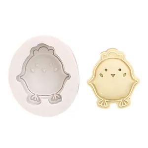 Detail view showing a cute cartoon chick shaped silicone mold with the finished product