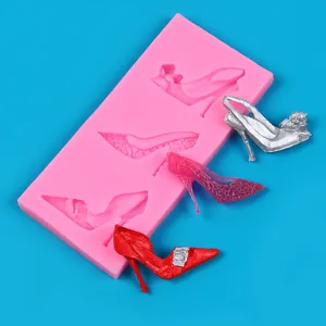 Detailed view of pink silicone mold with three distinct high-heel shoe designs and samples