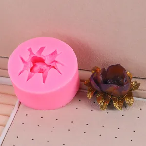 Detail view of pink silicone flower mold showing intricate 3D rose petal design