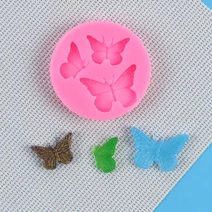 Pink silicone mold with butterfly designs for fondant cake and chocolate crafts