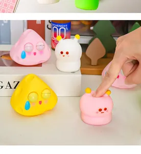 Detailed shot of cute cartoon squishy stress relief toys with funny expressions